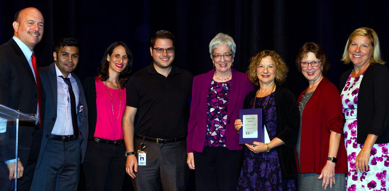 Picture of the California Department of Aging receiving the Innovation in Health Care Award at the California Summit on Long-term Services & Supports in Sacramento.