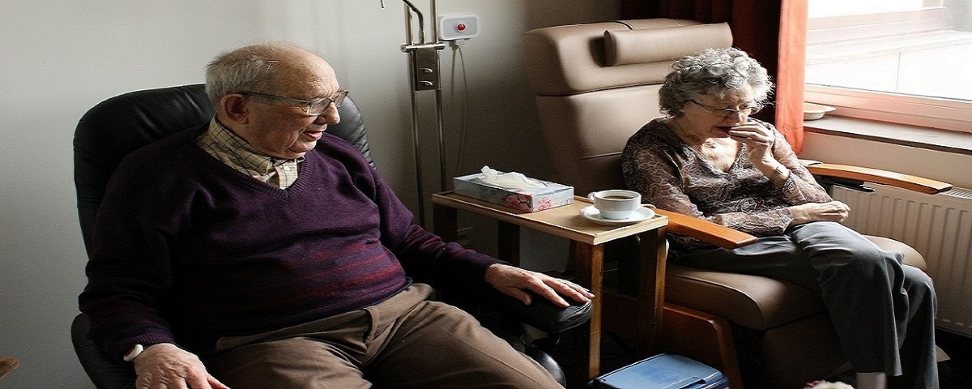 An elderly man in a classroom 