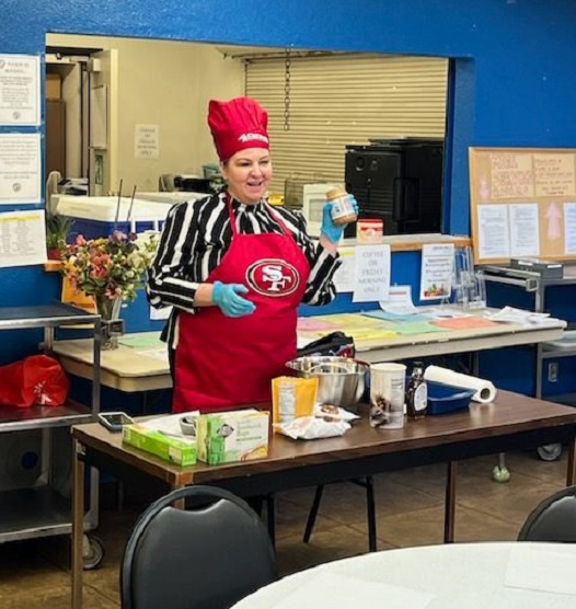 Image of a person cooking meals