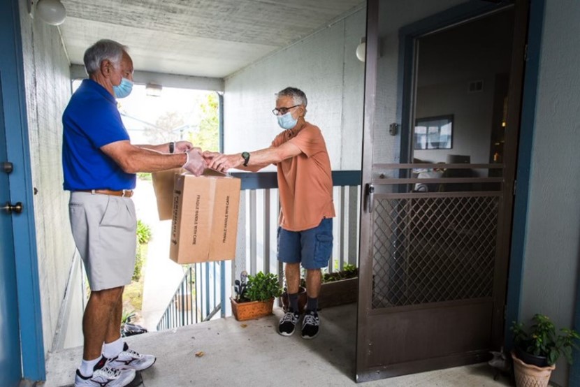 A person delivering meals