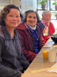 Image of Sun Ho and Christina sitting at a table